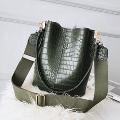 Women's Crocodile Leather Patterned Shoulder Bag Handbags Type: Shoulder Bags Types of bags: Shoulder & Crossbody Bags Main Material: PU Shape: Bucket Exterior: NONE Gender: Women Lining Material: None Number of Handles/Straps: Two Decoration: NONE Style: Fashion Occasion: Versatile Closure Type: Hasp Interior: Interior Slot Pocket Hardness: Soft Pattern Type: Alligator Item Type: Handbags Size(L*H*W): 24*28*16 Weight: 0.65kg Color: Brown, Black, Green, Beige Shoulder Strap Length: 110cm / 43.31 Wool Tote Bag, Kavu Rope Bag, Tas Bahu, Soft Leather Tote, Waterproof Tote, Real Leather Bags, Pu Leather Bag, Rope Bag, Crocodile Leather