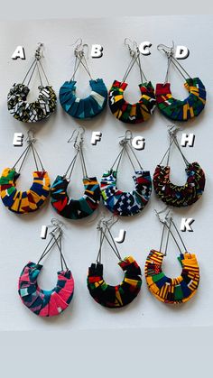 "These Beautiful Ankara fabric earrings are 4\" long., they are light weight. Earrings may differ from photo shown due to the cut of the fabric and/or the size selected. . Please observe the size display pictured. They are not returnable. Still Shopping please visit our other store and favorite it. Thanks Juanjayzzdesign.Etsy.com" Fabric Earrings Diy, Crochet Keyring Free Pattern, African Jewelry Earrings, African Crochet, African Fabric Accessories, Fabric Earring, Ankara Accessories, Ankara Earrings, Textile Earrings