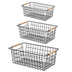 three black wire baskets with wooden handles on each side, one is empty and the other has