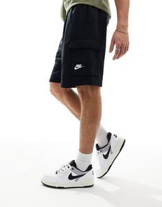 Shorts by Nike Take the short cut Branded design Regular rise Elasticized waistband Functional pockets Regular fit Sporty Cargo Shorts With Built-in Shorts, Sports Bermuda Shorts With Pockets, Sporty Cargo Shorts With Multiple Pockets, Sports Shorts With Pockets, Knee-length, Sporty Cargo Shorts With Multiple Pockets For Sports, Sporty Bermuda Cargo Shorts With Side Pockets, Utility Sports Bottoms With Built-in Shorts, Nike Streetwear Bottoms With Side Pockets, Sports Athletic Shorts With Cargo Pockets