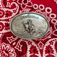 Montana Silversmith WYOMING belt buckle. Made for 2” belt. Mountain scene with Wyoming bucking horse. Engraved back. Gift box. Belt Buckles Cowgirl, Country Belt Buckles, Country Belts, Cowboy Shop, Bucking Horse, Cowboy Gear, Country Style Outfits, Mountain Scene, Style Outfits