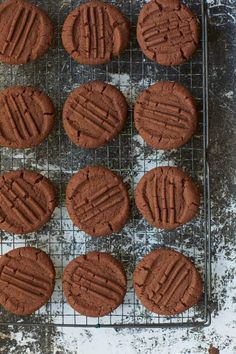 chocolate cookies cooling on a wire rack, ready to be baked in the oven for consumption