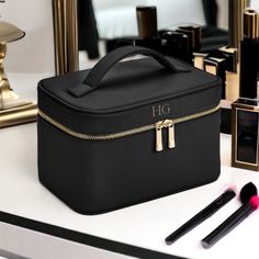 Introducing our Personalised Vanity Makeup Case, the perfect accessory for all your beauty needs! This monogram initials cosmetic bag is made from high-quality faux leather, ensuring durability and longevity. With its elegant design and spacious compartments, this makeup case is perfect for storing all your beauty essentials. Not just limited to cosmetics, this case can also be used as a jewellery box for your precious pieces. The monogram makeup bag comes with a stylish monogrammed design, making it a great personalised gift for bridesmaids or anyone who loves makeup. Featuring a spacious main compartment and an internal pouch pocket, this vanity case can easily accommodate your daily essentials, including your favourite lipsticks, brushes, and other makeup accessories. The easy-to-carry Pouch For Makeup, Elegant Rectangular Cosmetic Bag For Gifts, Luxury Rectangular Cosmetic Bag For Personal Use, Modern Rectangular Cosmetic Bag As Gift, Luxury Cosmetic Bag For Personal Use, Classic Rectangular Cosmetic Bag As Gift, Makeup Box Design, Vanity Box Makeup, Modern Rectangular Cosmetic Bag For Gift