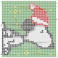 a cross - stitch pattern with a santa clause riding a white horse in green and red