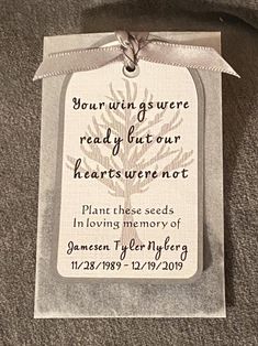 a white tag with a tree on it that says, your when we are ready to our hearts were not plant these seeds in loving memory of someone else