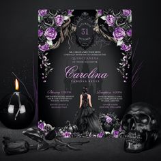 a black and purple wedding card with skulls, roses and candles in front of it