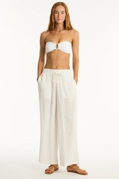 The ultimate wear-anywhere look for beachside cool and beyond. A perfect piece to layer over your favourite swim, or in mix-and-match colours for polished resort chic. Cotton cheesecloth fabric Side pockets High waisted leg pant Drawstring cord & elastic waist Fabric Composition:100% Cotton Beachy Tie-side Bottoms For Poolside, Beachwear Bottoms For Vacation, Beachy Pants For Poolside, Beachy Poolside Pants, Summer Long Pants For Poolside, Vacation Loungewear Tie-side Bottoms, White Tie-side Pants For Beach Season, Beachy Pants For Poolside And Beach Season, White Tie-side Beachwear Pants