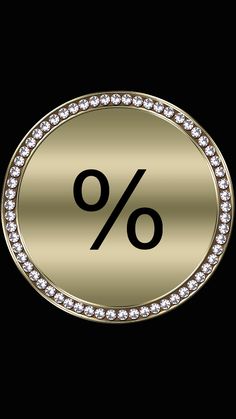 an image of a gold button with the number 0 on it's side and diamond border