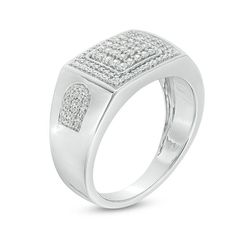 Bring him the bling with this distinctive and sparkling diamond ring. Crafted in sterling silver, this bold design showcases a framed squared diamond composite at its center wrapped in a rectangular diamond border. Shaped side accents filled with diamonds are a unique touch. Handsome with 1/2 ct. t.w. of diamonds and a bright polished shine, this style shimmers. Custom-made to fit his ring size. Sterling silver rings cannot be resized after purchase. Luxury Diamond Ring With Rectangular Stone, Luxury Rings With Diamond Accents And Rectangular Stone, Luxury Rings With Rectangular Diamond Accents, Luxury Diamond Ring With Rectangular Stone For Anniversary, Luxury Rectangular Diamond Anniversary Ring, Square Cut Diamond White Ring, White Square Cut Diamond Ring, White Square-cut Diamond Ring, Dazzling Square-cut Diamond Ring