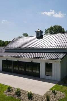 Board and Batten Steel Siding pairs the beautiful aesthetic of traditional siding with the strength and durability of steel. Board And Batten Metal Building, Metal Board And Batten Siding, Board And Batten Shed, Vertical Metal Siding, Hangar Home, Farmhouse Sheds, Metal Garage Buildings, Granny House