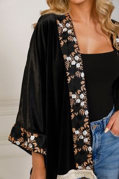 Featuring: Jacket Cardigan Fringe on Bottom Hem and Back Floral Embroidery Premium Velvet Mini Length Color: Black.Brand: Unmatched BYU Length: x Elegant Black Embroidered Kimono, Embroidered Open Front Outerwear For Fall, Elegant Black Kimono With Floral Embroidery, Elegant Black Floral Embroidery Kimono, Black Embroidered Fall Kimono, Black Long Sleeve Outerwear With Embroidered Cuffs, Black Outerwear With Embroidered Cuffs And Long Sleeves, Black Cardigan With Floral Embroidery, Elegant Black Embroidered Cardigan