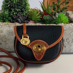 I Am Always Open To Reasonable Offers. Vintage, Dooney & Bourke, 130e, Wild West Licorice Black 1990's Cavalry Collection. Awl, Pebbled Leather With Brittish Tan Trim. Crossbody Style, Bag Has Great Form And Can Be Worn On A Belt. Leather Loop For Belt Attachment. Solid Brass Closure And Original Dooney Duck Fob. Size: 6.25 X 4.75 X 2 Comes In A Generic Dust Bag. Tan Trim, Gift Card Exchange, Belt Leather, Dooney & Bourke Bags, Licorice, Wild West, Best Brand, Dooney Bourke, Pebbled Leather