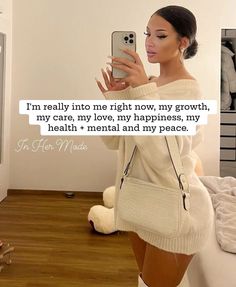 a woman taking a selfie with her cell phone in front of her face and the caption reads, i'm really into one right now, my growth, my