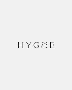 the word hygge written in black ink on a white background