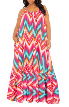 Breeze through your day in this printed maxi dress boasting a flowy silhouette, adjustable straps and handy pockets. Slips on over head Scoop neck Adjustable straps Side-seam pockets 100% polyester Hand wash, line dry Imported Beach Maxi Dress With Pockets, Vacation Maxi Sundress With Pockets, Maxi Sundress With Pockets For Vacation, Bohemian Maxi Dress With Pockets For Vacation, Vacation Maxi Dress With Pockets, Flowy Maxi Dress With Pockets, Color Chevron, Long Shirt Dress, Chevron Print