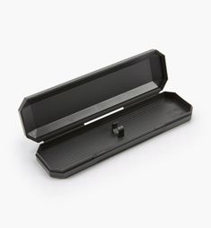 A variety of presentation cases suitable for pens and pencils. The black leatherette case will hold one of our large pens (such as the El Grande) or two slim pens/pencils. The hinged black plastic case has an integral clip that will hold all our pen styles except the extra-large twist and El Grande pens. The black plastic felt-lined case will hold two narrow turnings or any pen except the El Grande. All are 6 1/2" long. The attractive, hinged-lid hardwood case is about 2 1/4" wide by 6 1/2" long Felt Case, Lee Valley Tools, Lee Valley, Pens And Pencils, Pens Pencils, Pen Case, Hinged Lid, Upper Case, Black Plastic