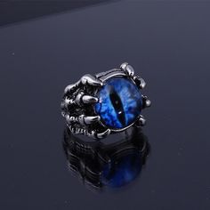 Why Eye Of Sauron Ring Is Necessary? The Best Eye of Sauron Ring is a reminder of the power of Sauron and the dark lord's influence over Middle-earth. It is also a physical representation of Sauron's all-seeing gaze, which is said to be able to penetrate even the strongest defenses. Sauron jewelry is that they are designed to protect the wearer from evil and ward off the evil that has been directed at them. Wearing any piece of jewelry with the Sauron symbol on it provides the wearer with both p Gothic Stainless Steel Metal Ring Jewelry, Gothic Metal Rings For Collectors, Gothic Collectible Metal Rings, Halloween Stainless Steel Ring Jewelry, Streetwear Necklace, Evil Eye Rings, Vampire Skull, Gothic Skeleton, Eye Rings