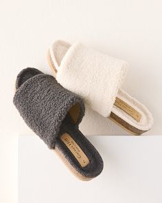 We gave these comfy sherpa fleece slippers a touch of structure, so they're just right for relaxing around the house or dashing to the mailbox. Made in Italy, with a comfy but sturdy cork footbed and man-made sole.  Exclusive. Cork footbed lined with sherpa fleece. Man-made sole. Italy. Cozy Open Toe Slippers With Cushioned Footbed, Cozy Synthetic Slippers With Textured Footbed, Comfy Slippers With Faux Fur Lining, Cozy Indoor Suede Slippers, Comfortable Open Toe Slippers With Faux Fur Lining, Cozy Slippers With Plush Lining, Indoor Slippers With Faux Fur Lining, Cozy Brown Shearling Slippers, Cozy Shearling Slip-on Slippers