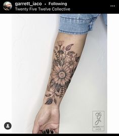 a person with a flower tattoo on their arm