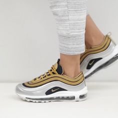 Nike Air Max 97 Colorway: Black/Metallic Silver-Metallic Gold The Black Base Of The Women’s Air Max 97 ‘Metallic Gold’ Is Accented By Metallic Gold Overlays And Metallic Silver On The Mudguard. Additional Pops Of Metallic Gold Appear On The Lining And Heel Loop, As Well As The Mini-Swoosh That Adorns The Black Mesh Quarter Panel. Style # Aq4137-700 Be Sure To Follow Us. We Post A Lot Of Items And Offer Bundle Pricing Discounts. Share If You Like It; Like If You Want To Purchase It. Nike Silver Sneakers, Nike Gold, Nike Air Max 97, Black Metallic, Black Mesh, Air Max Sneakers, Metallic Gold, Womens Shoes Sneakers, Air Max