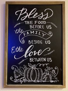 a chalkboard sign that says, blessing the food before us family beside us love between us