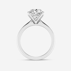 a diamond engagement ring on a white background