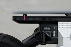 a close up view of the handlebars on a motorcycle's rear tire