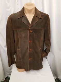 Amazing Vintage 1950s-60s DEADSTOCK Scully Men's Brown Colorblock Leather Rancher Suede Jacket Button Coat, Heavy.  Jacket has a 4 button front closure, 2 front pockets, a satin lining, accent stitching details throughout. Jacket is in amazing New vintage condition - (see pics)! Measurements when buttoned: shoulder to shoulder 20 in, chest 46 in, waist 44, sleeves shoulder to cuff 26, sleeves pit to cuff 17, neck to bottom length 31 1/2 inches. Vintage Leather Sport Coat With Long Sleeves, Retro Brown Outerwear For Formal Occasions, Retro Brown Formal Outerwear, Vintage Leather Outerwear With Button Closure, Vintage Brown Sport Coat With Button Closure, Vintage Fall Sport Coat With Button Closure, Vintage Brown Outerwear With Button Closure And Long Sleeves, Vintage Leather Blazer With Button Closure, Vintage Leather Single Breasted Sport Coat