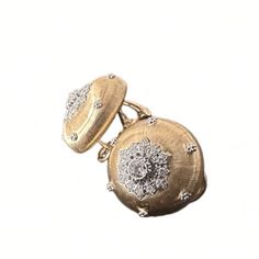 This exquisite pair of Round Button Gold Earrings is a harmonious blend of timeless elegance and intricate craftsmanship. Each earring, measuring 17 x 17 mm, is meticulously engraved to emulate the luxurious texture of silk, creating a unique and refined aesthetic. Adorned with 0.33 carats of natural diamonds, the sparkle adds a touch of glamour to the overall design, catching the light with every movement.Item Details• Made to Order.• Gold Kt: 18K Solid Gold• Custom Gold Color: Rose Gold, Yello Luxury Earrings With Intricate Design, Luxury Yellow Gold Ceremonial Earrings, Luxury Yellow Gold Earrings For Ceremonial Occasions, Luxury White Gold Clip-on Earrings For Formal Occasions, Luxury Ceremonial Yellow Gold Earrings, Luxury Round Earrings For Ceremonial Occasions, Luxury Gold Engraved Earrings, Luxury Engraved Gold Earrings, Luxury Engraved Earrings For Anniversary