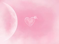 a heart shaped object floating in the air next to a half moon and pink sky