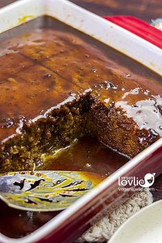 a close up of a cake in a pan on a table