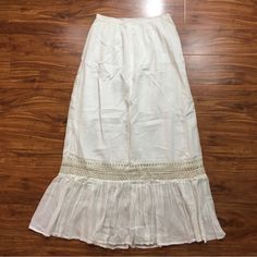 Brand New With Tag. Perfect Maxi Skirt That Can Be Worn All Spring And Summer. Off White Color. Side Zip. Lined But Is Sheer. Tiered With Crochet Details. 100% Cotton. Boho, Hippie, Beach, Glam, Cottagecore, Vacation, Western, Southwest, Tropical, Streetwear, Coastal, Grannycore, Coastal Grandma, Summer, Spring, Fall. Brand New- Theres Some Light Yellow Staining. Likely To Come Out One Washed. Clean Before Wearing Size Small Casual Maxi Skirt With Lace Trim, Summer Long Skirt With Crochet Trim, Spring Bottoms With Crochet Trim And Flowy Skirt, Casual Skirt With Crochet Trim For Vacation, Spring Bottoms With Crochet Trim And Flowy Fit, Summer Flowy Skirt With Crochet Trim, Flowy Crochet Trim Skirt For Summer, Tropical Streetwear, Glam Cottagecore