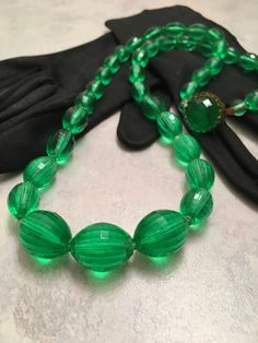 Green beaded neclace, Graduated diamond cut Green Beads, 1940's, 27 inch necklace, Vintage green multi fasceted diamond cut beads by MoniquesFinery on Etsy https://www.etsy.com/listing/479961722/green-beaded-neclace-graduated-diamond Green Beaded Necklace, Green Beads, Glass Bead Necklace, Necklace Vintage, Green Bead, Simply Beautiful, Diamond Cut, Natural Light, Diamond Cuts