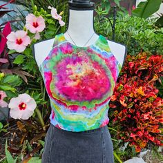 Hand Dyed- This one of a kind geode crop top has been hand-dyed in beautiful Sarasota, Fl with green and pink colors. Our boho tie dye medium crop tops are a unique retro outfit to wear to a concert or hippie festival. They are great to wear to yoga, pilates, and the gym. Support eco friendly made in USA clothing! Feel good knowing that you are making a difference by purchasing fair trade ethical fashion. Perfect gift for a girlfriend, friend, sister, or daughter- or for yourself! Dyes- High-quality procion dyes from Dharma Trading Company. Top- 92% Cotton, 8% Elastane. Very soft mid weight cotton. Slight Stretch. Sourced from Dharma Trading. Made in the U.S.A.  Sizing- Medium (Women's) - Length 14 inches Width 16 inches It is a cotton/elastane blend and stretches about 1 inch larger than Fitted Tie Dye Crop Top For Festivals, Fitted Cotton Tie Dye Crop Top, Bohemian Tie-dye Crop Top For Festivals, Hippie Cotton Tie-dye Top, Bohemian Tie-dye Cotton Crop Top, Boho Tie Dye, Tie Dye Crop Top, Hippie Festival, Usa Outfit