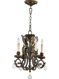 a chandelier with five candles hanging from it