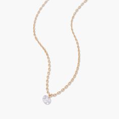 Add a touch of sparkle to your look with the Layla 14K Gold Diamond Necklace. Featuring a stunning lab grown floating diamond, this necklace is sure to turn heads and elevate any outfit. Perfect for everyday wear or special occasions, it's a must-have for any jewelry collection. Available in 14k yellow gold Lab Grown Diamond Diamond size: 2.7mm round diamond Carat Weight: 0.07 16" cable chain with 2" extender Spring ring closure SKU: BYD0015 Fine Jewelry Solitaire Necklace With Delicate Chain, Everyday Luxury Diamond Necklace With Delicate Chain, Round Cut Solitaire Necklace With Delicate Chain, Elegant Diamond Charm Necklace With Single Diamond, Elegant Single Diamond Charm Necklace, Gold Diamond Necklace With Round Pendant, Solitaire Necklace With Cubic Zirconia Round Pendant, Gold Lab Grown Diamond Round Pendant Necklace, Cubic Zirconia Solitaire Necklace With Delicate Chain