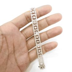 Slim vintage and Art Deco inspired diamond platinum bracelet. Adorned with white round cut diamonds in 6.12 carat total. Diamonds are all natural in G-H Color Clarity VS. Platinum 950 bracelet. Length: 17.5 cm Width. 1 cm Weight: 28.9 g [shortcode] [video] [/video] [/shortcode] Diamond Chandelier, White Gold Hoop Earrings, Platinum Bracelet, White Gold Hoops, Platinum Earrings, Colombian Emeralds, 18k Gold Jewelry, Art Deco Inspired, Yellow Diamond