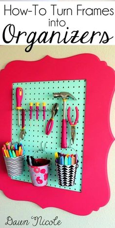 an organized peg board with scissors and pencils on it