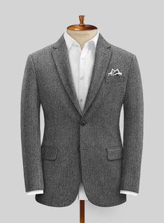 Throw some pattern into your attire with our Harris Tweed Gray Herringbone suit. Crafted from pure wool, the suit allows you to make an unforgettable impression. Don it with matching waistcoat, a white shirt and black derby shoes. 
 
 Look Includes  Harris Tweed Gray Herringbone Fabric  Two Button Jacket Style  Notch Lapel  Real Horn Solid Buttons  Single Vent  Three Cuff Buttons  Two Welted Back Pockets on Trousers   You can change the look by changing the options. 
 
Lining: Viscose; Dry Clean Grey Tweed Suit, Grey Wool Suit, Dapper Suits, Harris Tweed Jacket, Herringbone Suit, Double Breasted Overcoat, Brown Corduroy Jacket, Herringbone Jacket, Tweed Pants