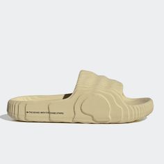 Adidas Adilette 22 'Desert Sand' Adidas Beige Synthetic Slides For The Beach, Beige Beach Slides, Cream Yeezy Slides, Beige Synthetic Beach Slides, Yeezy Slides Desert Sand, Adidas Adilette 22, Textured Aesthetic, Red Puffer, Adidas Adilette