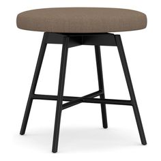 an upholstered stool with black legs and a tan seat pad on the back