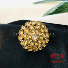 Tyaani Inspired Pacchi Kundan Golden Adjustable Ring Features: Adjustable Ring to match any finger size 22 Karat Gold Finish Lightweight Jewelry Made in Brass with very high quality Kundan stones Suitable for any occasion and traditional or Modern attire Ready to ship and available for local pickup from 23059. Please message us for more details Free shipping on orders above $75 within USA. Intricate Design Rings For Ceremonial Festivals, Ceremonial Rings With Intricate Design For Festivals, Hand Set Gold Rings For Festivals, Festive Temple Jewelry Toe Ring, Round Tilla Rings For Wedding, Adjustable Ceremonial Toe Rings, Traditional Adjustable Rings For Festive Occasions, Kundan Toe Ring As Gift, Intricate Design Ring For Festivals