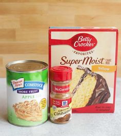 ingredients for cake sitting on top of a counter next to a can of cake mix