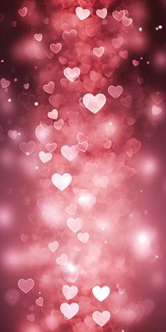 blurry pink hearts background with boket lights and sparkles for valentine's day