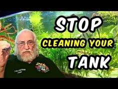 an older man holding up a glass with plants in it and the words stop cleaning your tank