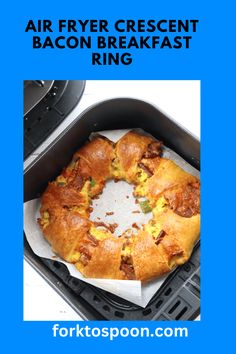 an air fryer crescent bacon breakfast ring on top of a pan with the words, air fryer crescent bacon breakfast ring