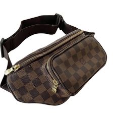 We guarantee the authenticity of this bag or your Full Money Back. The bag has been inspected and authenticated by our experts. Description: Authentic Pre-Owned Louis Vuitton Damier Ebene Melville Waist Bag Condition: Pre/Loved in Very Good Condition. Minimal Marks of Use Estimated Retail: $2,290 Details:Damier Ebene Coated CanvasBrass HardwareAdjustable Leather Strap Zipper Compartment at FrontZipper Pocket at Back. Zipper Closure at TopOne Compartment. Canvas Lining Measurement: Width 32cm / H Lv Damier Ebene, Lv Damier, Pre Owned Louis Vuitton, Louis Vuitton Damier Ebene, Damier Ebene, Vuitton Bag, Casual Backpack, Waist Bag, Bag Tags