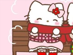 an image of a hello kitty sitting on a bench