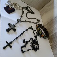 2 Rosary Styled Necklaces. 1 Dog Chain W Cross Necklace. 1 Wooden Catholic Saints Picture Bracelet. Never Worn. Sat In Jewelry Box. Wooden Cross Necklace, Picture Bracelet, Rosary Style Necklace, Dog Chain, Holy Rosary, Wooden Cross, Mens Accessories Jewelry, Cross Jewelry, White Silver