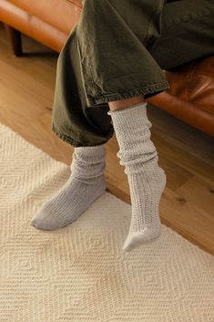 A necessary addition to your sock drawer, these so cozy and seriously soft socks are featured in a chunky, ribbed knit fabrication and slouchy silhouette with a seamed heel and toe. chunky ribbed knit slouchy seamed heel and toe Cozy Knitted Socks, Thick Casual Mid-calf Socks, Cozy Knee-high Knit Socks, Cozy Chunky Knit Socks With Round Toe, Cozy Chunky Knit Socks, Thick Knit Casual Socks, Comfortable Cozy Fall Socks, Casual Knitted Solid Color Socks, Casual Solid Knitted Socks